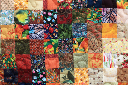 Part of the homemade patchwork as background