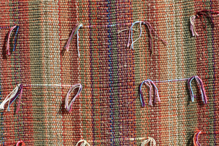 Fragment of the striped carpet as background