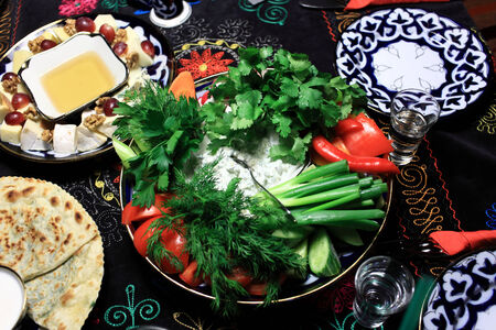 Fresh vegetables on a plate in the restaurantの写真素材