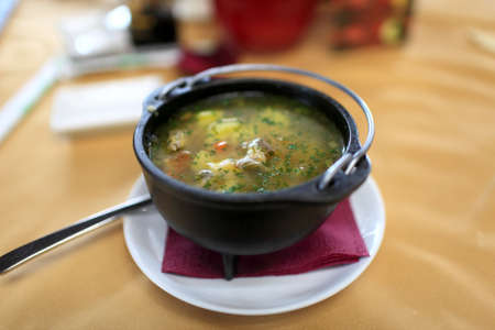 Plate with fish soup in the restaurantの写真素材