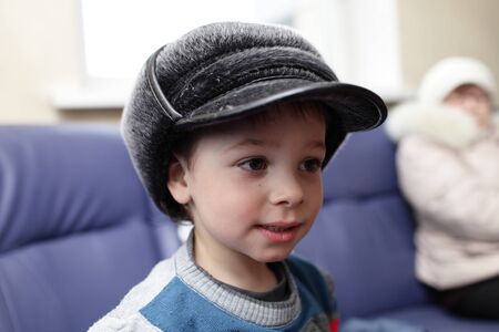 Portrait of a child in the big hatの写真素材