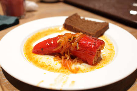 Pepper stuffed with vegetables and rice on a plate