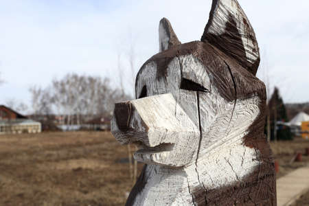 Head of painted Husky dog, carved from woodの写真素材