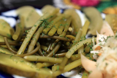 Marinated wild garlic on the plate at a restaurant
