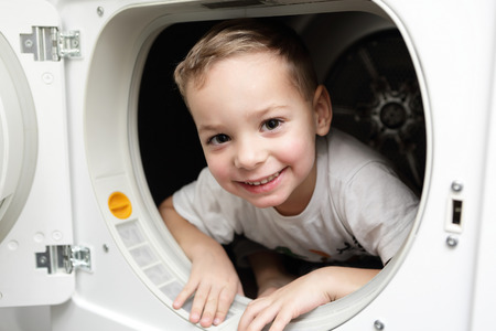 Portrait of a child in the dryerの写真素材