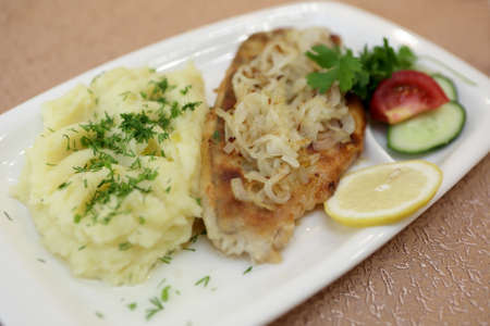 Plate with baked fillet of pikeperch and mashed potatoesの写真素材