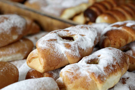 Various cakes on counter of outdoor marketの写真素材