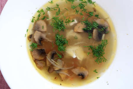 The mushroom soup with dill in a cafeの写真素材
