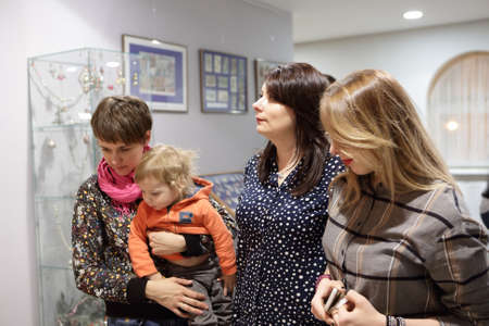 Portrait of women and child in museumの写真素材