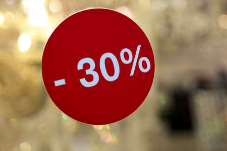 Discounted sign on glass wall in a shopping centerの写真素材