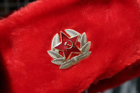 Russian red winter hat with emblem as souvenirの写真素材