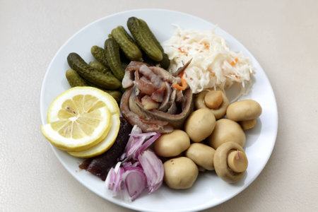 Plate with various pickles on a tableの写真素材