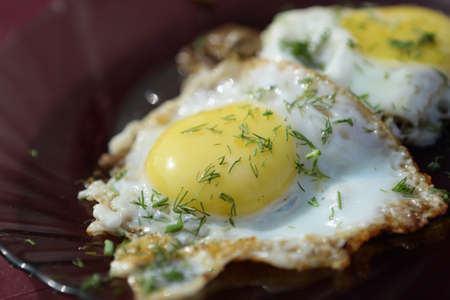 Fried eggs on a plate for breakfast