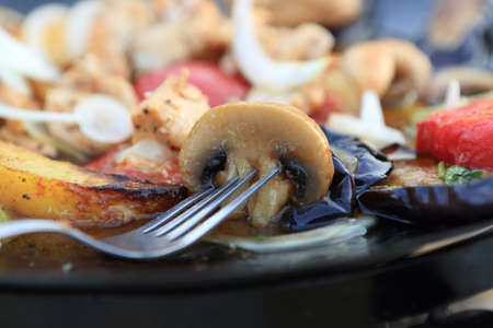 Saj kebab with mushrooms in a restaurantの写真素材
