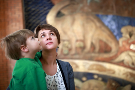 Portrait of mother with her son in museumの写真素材