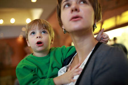 Portrait of mother and her son in museumの写真素材