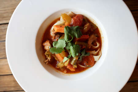 Lagman - uzbek lamb and noodle soup in restaurantの写真素材