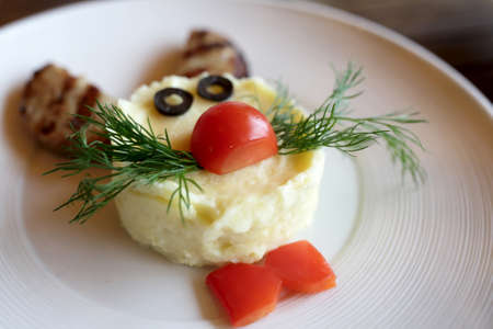Plate with cutlets and mashed potatoes in restaurantの写真素材