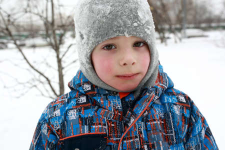 Portrait of a boy in winter parkの写真素材