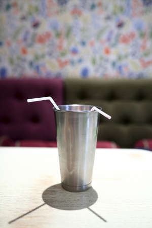 Cocktail in metal mug on a tableの写真素材