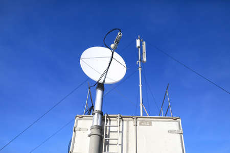 Details of satellite communication antenna on a sky background