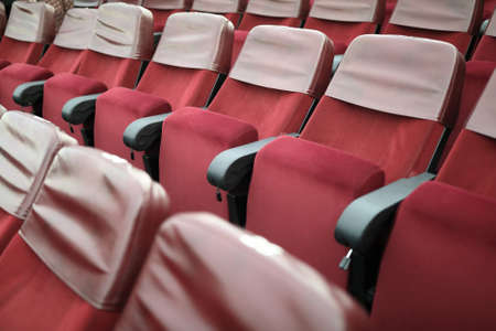 View of red chairs in the theaterの写真素材