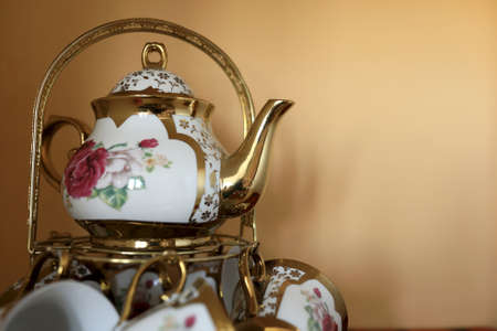 View of tea set on a wall background
