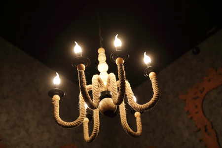 View of chandelier hanging on the ceilingの写真素材