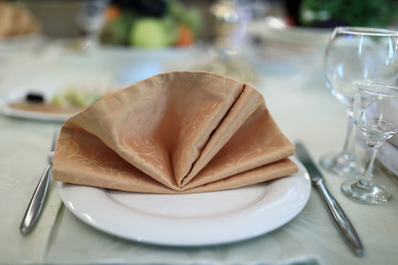 Napkin on a plate in the rstaurant