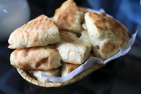 Pieces of Azerbaijani bread in the basketの写真素材
