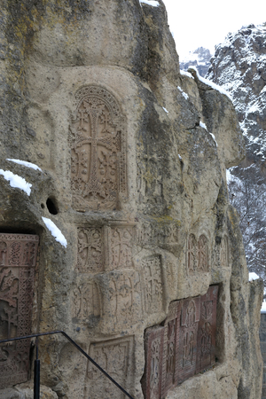 View of wall Geghard monastery in winter, Armeniaの写真素材