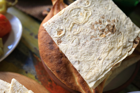 Plate with Armenian bread in a restaurantの写真素材