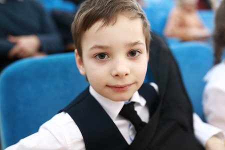 POrtrait of a boy in the theater
