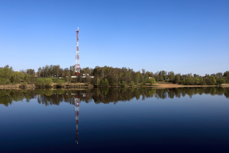 View of telecommunications tower on banks of Volga riverの写真素材