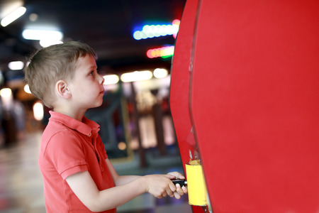 Portrait of child having fun in entertainment center