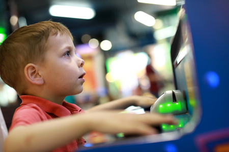 Portrait of kid having fun in entertainment centerの写真素材
