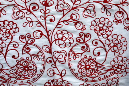 Details of towel embroidered with red thread
