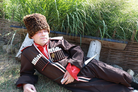 Portrait of person in a Cossack costume