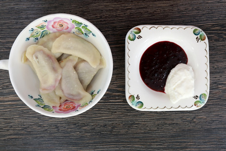 Dumplings stuffed with Cherry on plate in restaurantの写真素材