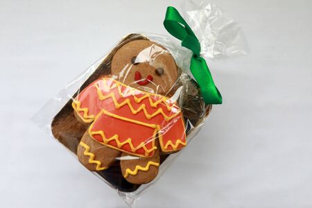 Gingerbread man in packaging on a table