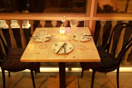 Restaurant terrace wooden table at night, Tbilisiの写真素材