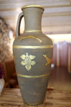 View of retro jug on wooden tableの写真素材