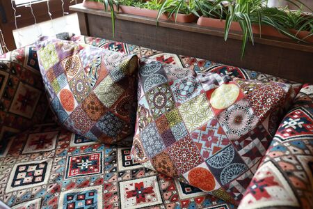Details of sofa with pillows in restaurant