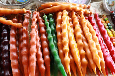 Pile of various churchkhela on market counterの写真素材