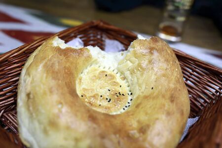 View of uzbek tortilla in basket in restaurant