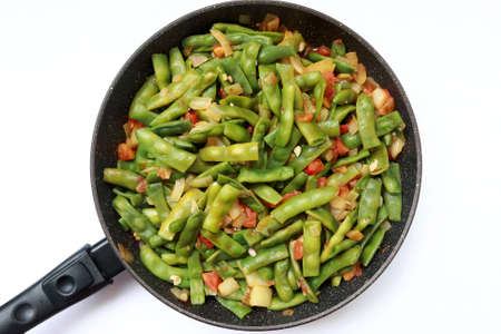 Baked chicken wings with macaroni on plateの写真素材