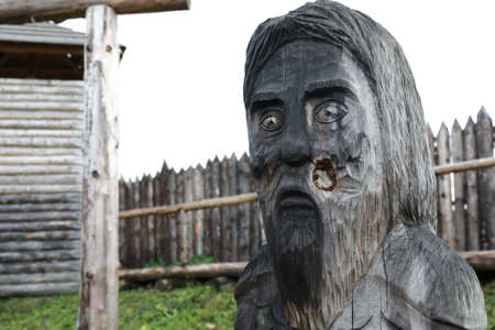 View of wooden scandinavian god in Viking temple in summerの写真素材