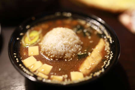 Miso soup with rice in a restaurantの写真素材