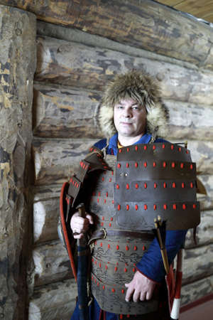 Portrait of man in medieval tatar leather armor