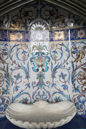 Details of fountain in oriental style with marble sink in palace